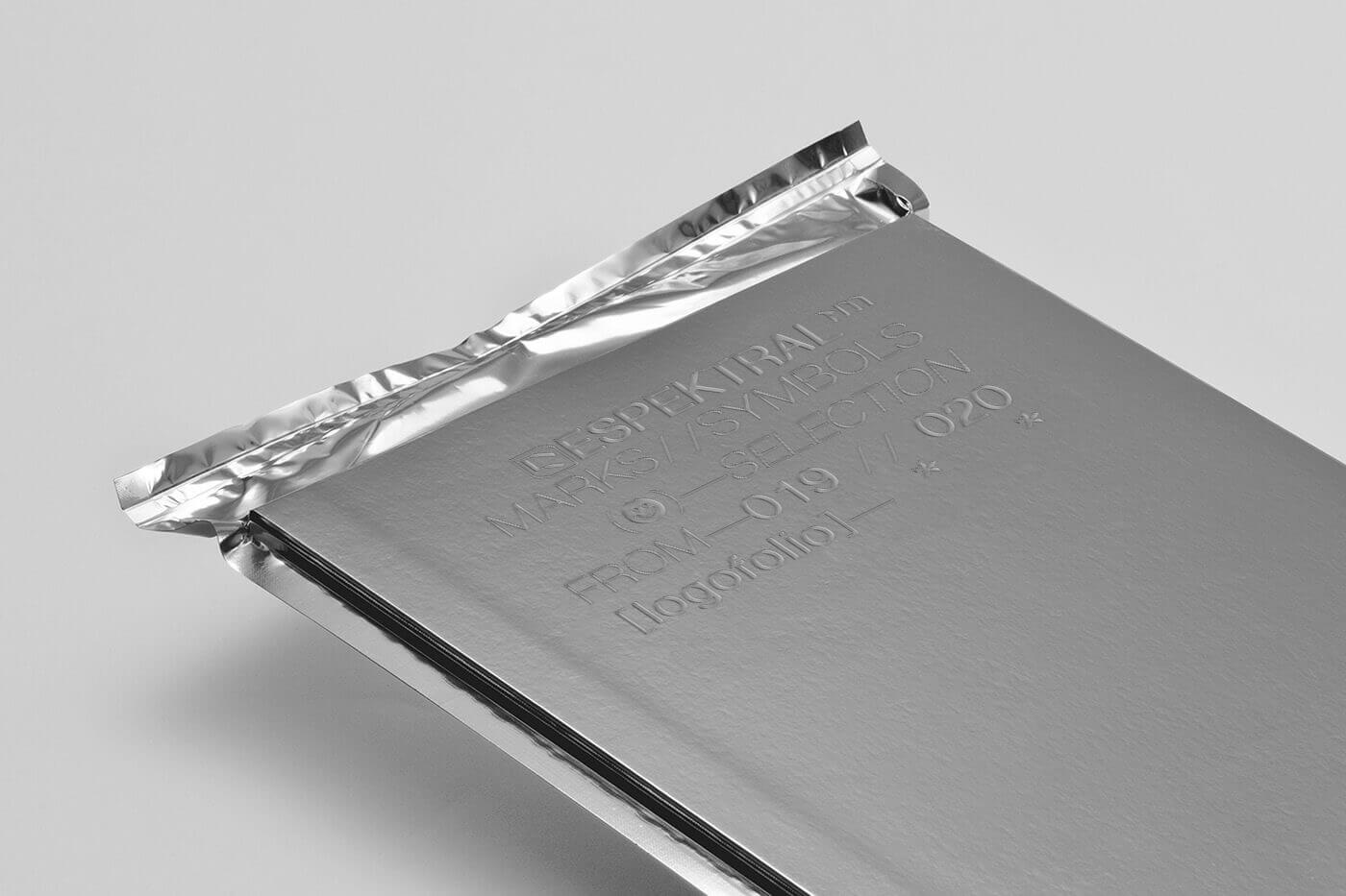 espektral-logo-book-brands-marks-silver-pouch